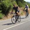 Nicolas Sarkozy se donne à vélo pendant ses vacances en famille au Cap Nègre près de Cavalaire, le 3 août 2013.