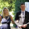 Le chanteur Michael Bublé et sa femme Luisana Lopilato, enceinte, au mariage d'un couple d'amis à Vancouver le 12 août 2013.