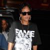 Rihanna se rend au Lyon à New York, habillée de lunettes "Bowie" signées Le Specs, d'un t-shirt Frank 151, d'un jean J Brand et de sandales Roberto Cavalli. Le 12 août 2013.