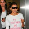 Eva Longoria, sans maquillage, arrive à l'aéroport international de Los Angeles le 16 août 2013