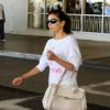 Eva Longoria, au naturel, arrive à l'aéroport international de Los Angeles le 16 août 2013