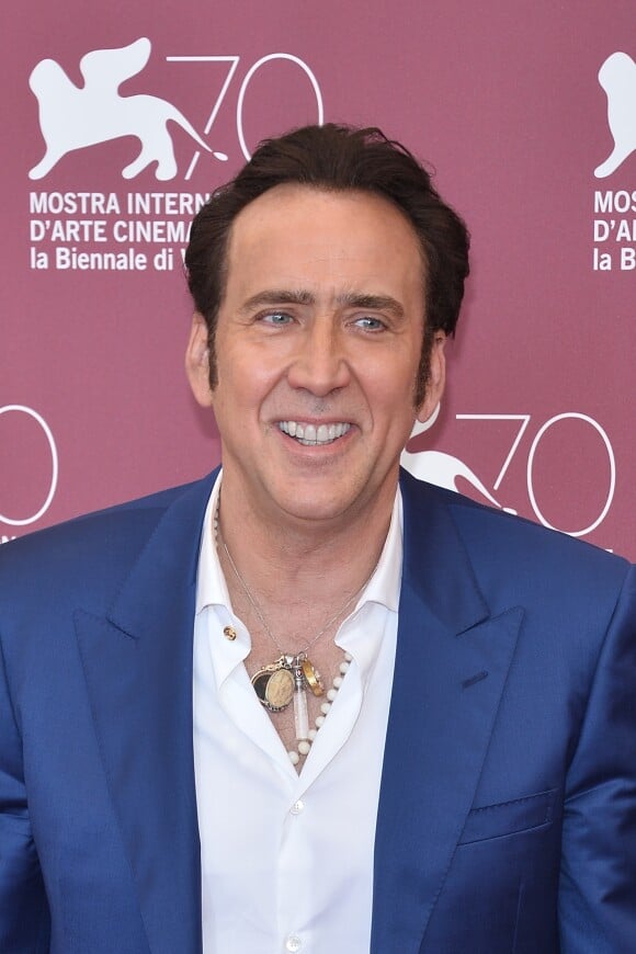Nicolas Cage heureux et renaissant lors du photocall du film "Joe" à la 70e Mostra de Venise, le 30 août 2013.