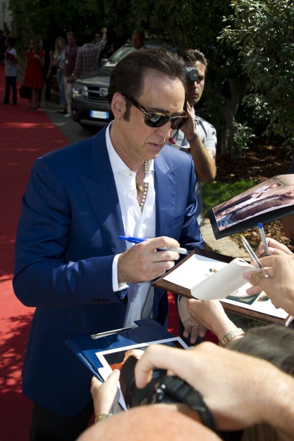 Nicolas Cage arrive au photocall du film "Joe" à la 70e Mostra de Venise, le 30 août 2013.
