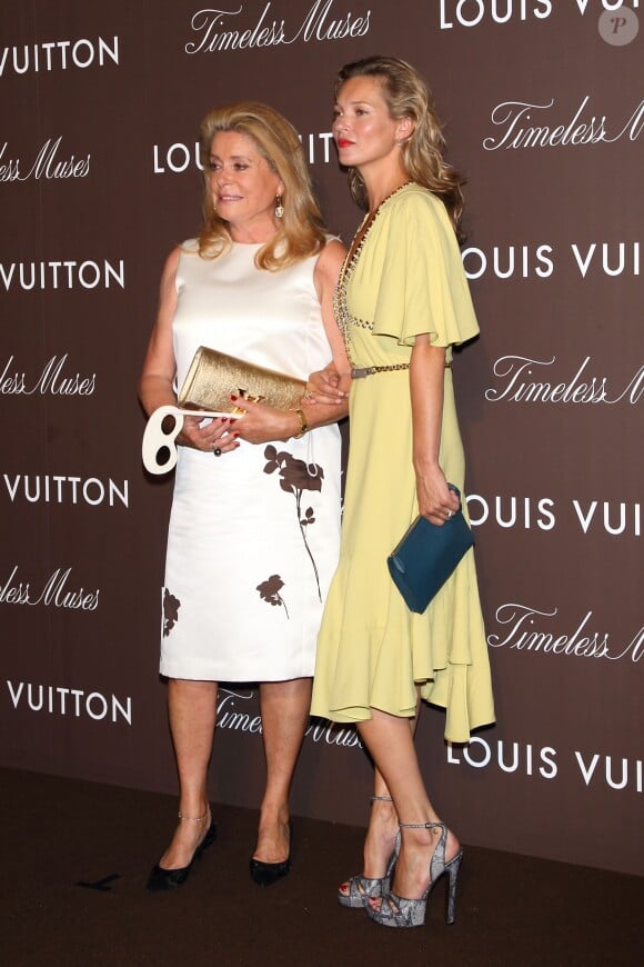Catherine Deneuve et Kate Moss, invitées de marque du vernissage de l'exposition The Timeless Muses de Louis Vuitton au Tokyo Station Hotel. Tokyo, le 29 août 2013.