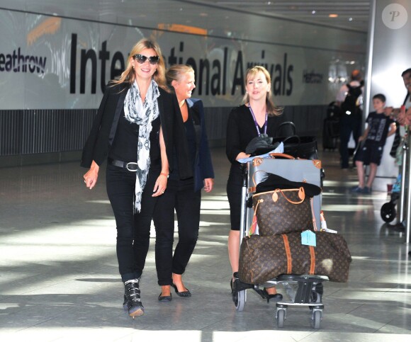 Kate Moss à l'aéroport d'Heathrow à Londres, le 31 août 2013.