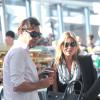 Kate Moss et son mari Jamie Hince à l'aéroport d'Heathrow. Londres, le 31 août 2013.