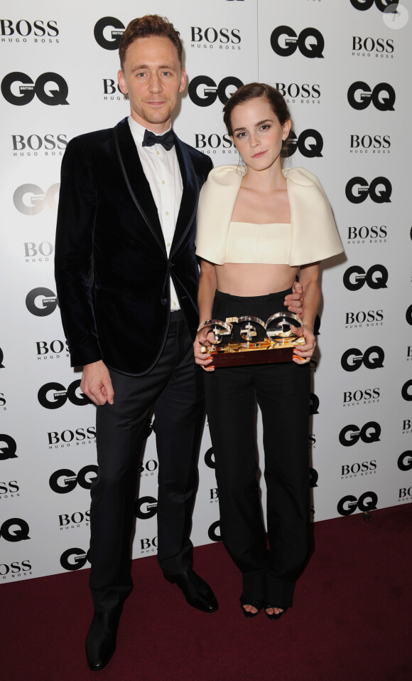Tom Hiddlestone et Emma Watson lors des GQ Men of the Year Awards à la Royal Opera House. Londres, le 3 septembre 2013.