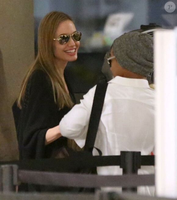 Angelina Jolie, ici avec Maddox, quitte les Etats-Unis avec ses enfants, Maddox, Shiloh, Pax, Zahara, Vivienne et Knox arrive, ici à Los Angeles, le 4 septembre 2013.