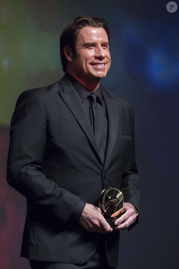 John Travolta fait son discours au moment de l'homme qui lui a été rendu au Festival du film americain de Deauville, le 6 septembre 2013.