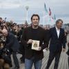 Inauguration de la cabine au nom de John Travolta sur les planches de Deauville, le 6 septembre 2013, lors du Festival du film américain de Deauville.