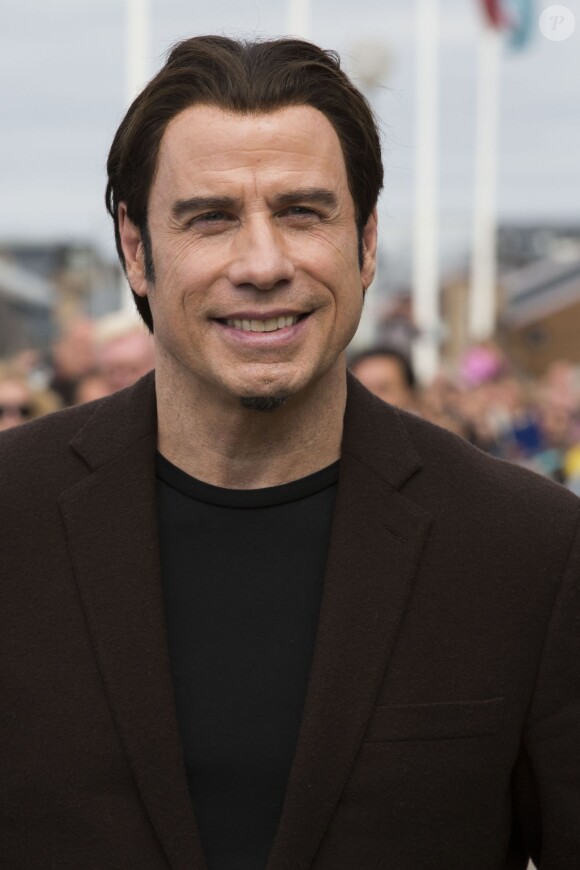 Inauguration de la cabine au nom de John Travolta sur les planches de Deauville, le 6 septembre 2013, lors du Festival du film américain de Deauville.