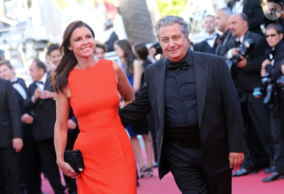 Isabelle de Araujo et Christian Clavier lors de la montée des marches du film "The Immigrant" lors du 66eme festival du film de Cannes le 24 mai 2013