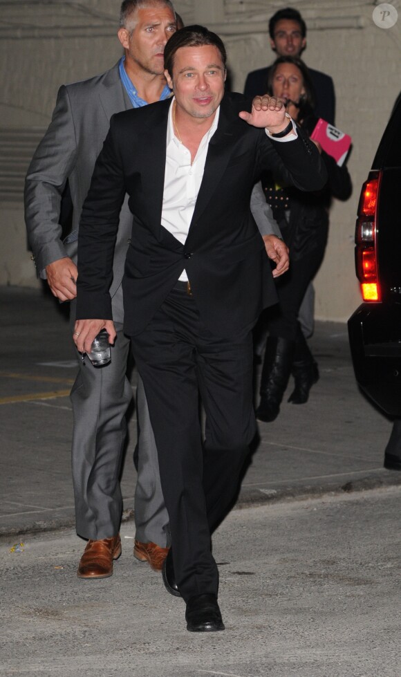 Brad Pitt quittant la présentation du film Twelve Years a Slave au Festival de Toronto le 6 septembre 2013