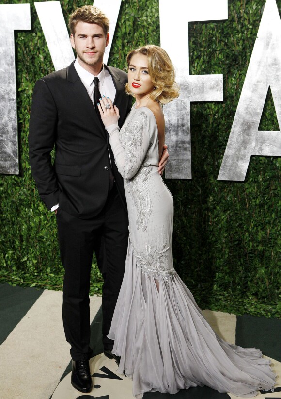 Miley Cyrus et Liam Hemsworth lors de la soirée Vanity Fair post-Oscar Party à Los Angeles le 26 février 2013