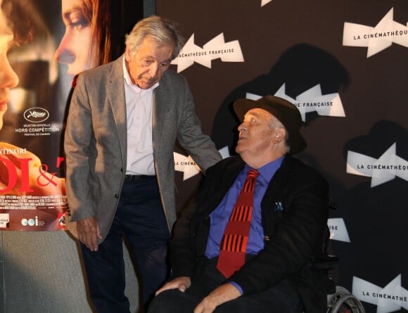 Bernardo Bertolucci et Constantin Costa-Gavras lors de la première du film "Moi et Toi" à la Cinémathèque française à Paris, le 16 septembre 2013.