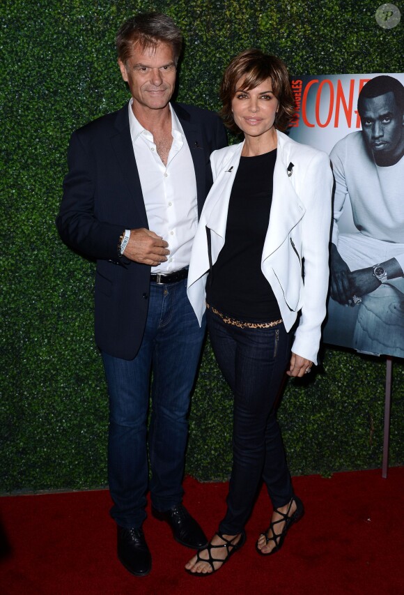 Lisa Rinna et son mari Harry Hamlin à la soirée du magazine Los Angeles Confidential, intitulée LA Confidential Pre-Emmy Kick-Off Celebration, en hommage à la cover girl de septembre 2013 Morena Baccarin, à Los Angeles, le 19 septembre 2013.