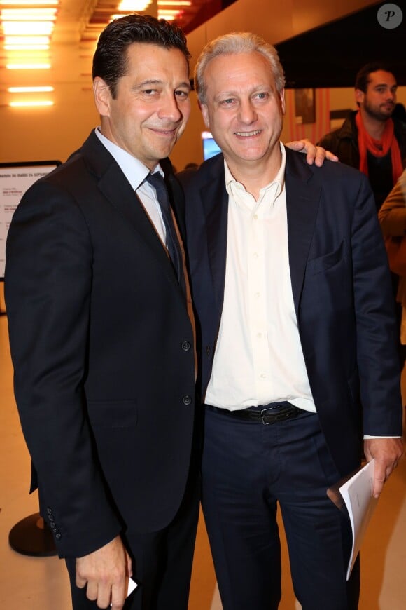 Yves Bigot et Laurent Gerra pour la présentation de son téléfilm "L'escalier de fer", au Forum de l'image à Paris le 23 septembre 2013