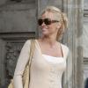 Pamela Anderson quitte son hôtel à Berlin, le 25 septembre 2013.