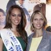 Hinarani de Longeaux, première dauphine de Miss France 2013, et Sylvie Tellier au salon Top Resa à Paris, Porte de Versailles, le 25 septembre 2013.