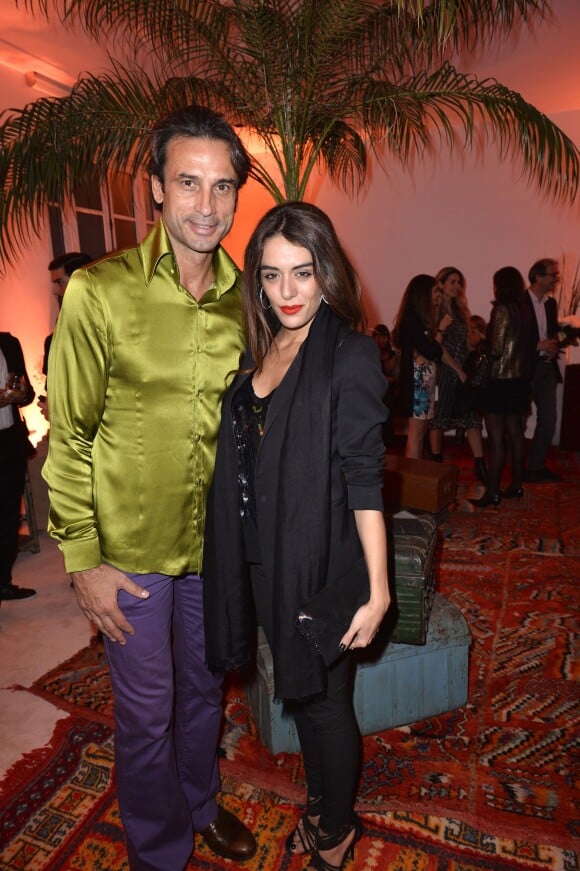 Adanan Taletovic et Sofia Essaidi au premier défilé de mode prêt à porter printemps-été 2014 du créateur Adnan Taletovic à Paris le 26 septembre 2013.
