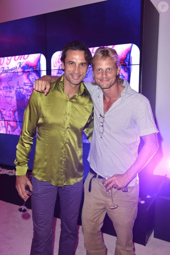 Adanan Taletovic et Arnaud Lemaire au premier défilé de mode prêt à porter printemps-été 2014 du créateur Adnan Taletovic à Paris le 26 septembre 2013.