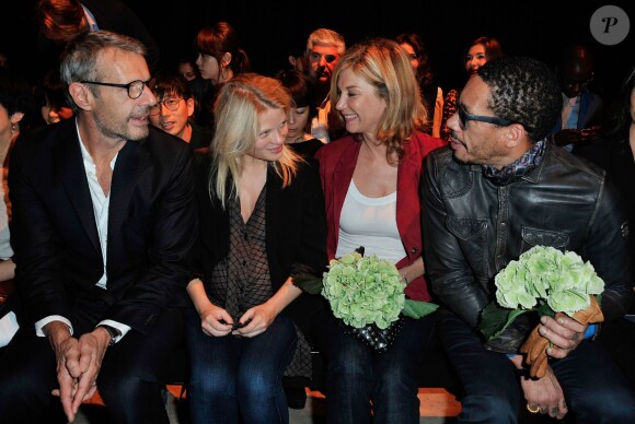 Lambert Wilson, Melanie Thierry enceinte, Michèle Laroque et JoeyStarr au défilé Paul & Joe, collection prêt-à-porter printemps-été 2014, au Palais de Tokyo à Paris, le 1er octobre 2013.