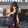 Selena Gomez arrive à l'aéroport de Los Angeles, le 28 septembre 2013.