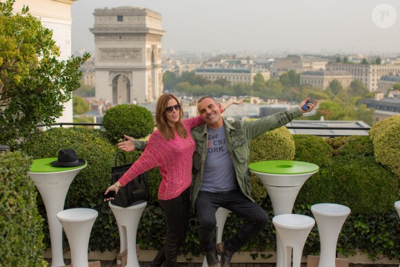 Exclusif - Christian Audigier et Nathalie Sorensen lors de leur week-end en amoureux à Paris le 27 septembre 2013.