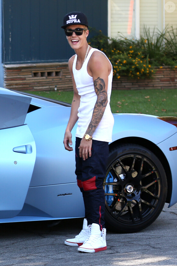 Justin Bieber avec sa Ferrari à Los Angeles, le 15 août 2013.