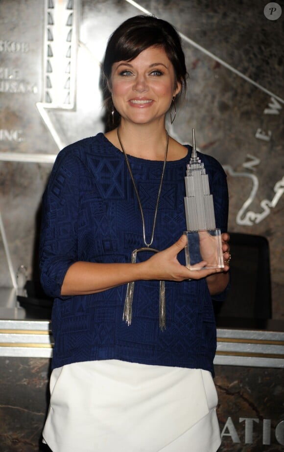 Tiffani Thiessen à l'Empire State Building pour présenter la campagne Jumpstart's Read for the Record à New York, le 2 octobre 2013.