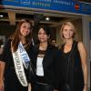 Marine Lorphelin aux côtés de Sandrine, sa mère, et Sylvie Tellier lorsqu'elle arrive à l'aéroport de Roissy Charles de Gaulle le 30 septembre, de retour de Bali où elle est arrivée première dauphine lors de l'élection Miss Monde 2013.