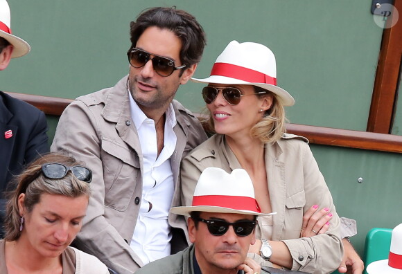 Sylvie Tellier et son nouveau compagnon et futur papa au tournoi de Roland-Garros, le 2 juin 2013.