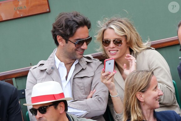 Sylvie Tellier et son compagnon au tournoi de Roland-Garros, le 2 juin 2013.
