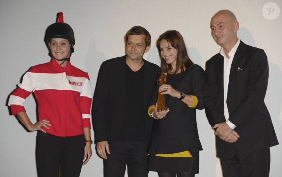 Laurent Mariotte, Sophie Le Saint et Francois Lenglet lors de la remise des trophées de la 20ème édition des Trophées Epona à Cabourg, le 12 octobre 2013