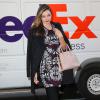 Miranda Kerr se rend dans un building pour une réunion avec le magazine Cosmopolitan à New York, le 15 octobre 2013.