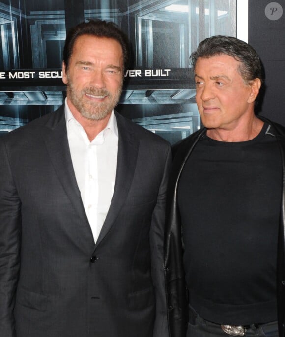 Arnold Schwarzenegger, Sylvester Stallone à la première du film Evasion (The Escape Plan) à New York le 15 octobre 2013.