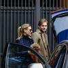 Michelle Hunziker et Tomaso Trussardi sortent de chez eux avec leur petite Sole le 19 octobre 2013 à Milan.
