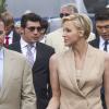 La princesse Charlene de Monaco et Byron Kelleher accompagnés de Rick Yune au Yacht Club de Monaco, le 24 mai 2013