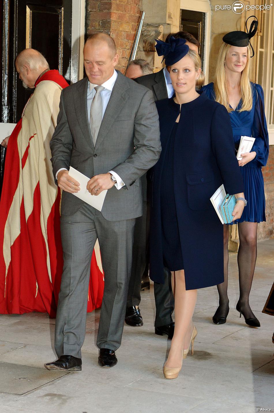 Mike Tindall et Zara Phillips au baptême du prince George de Cambridge, premier enfant du prince William et de Kate Middleton, en la chapelle royale du palais Saint James, à Londres, le 23 octobre 2013.