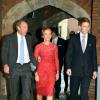 Michael et Julia Samuel (marraine) avec Hugh Grosvenor (parrain) au baptême du prince George de Cambridge, premier enfant du prince William et de Kate Middleton, en la chapelle royale du palais Saint James, à Londres, le 23 octobre 2013.