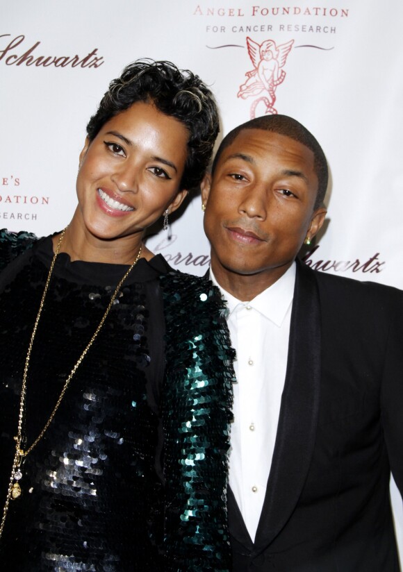 Helen Lasichanh et son mari Pharrell Williams assistent à l'Angel Ball de la fondation Gabrielle's Ange, au restaurant Cipriani. New York, le 29 octobre 2013.