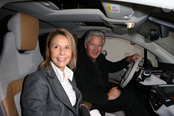 Pierre Dhostel et sa femme Carole Bellemare lors de l'Electro Night pour le lancement de la BMWi3 au pavillon Cambon, Paris, le 13 novembre 2013.
