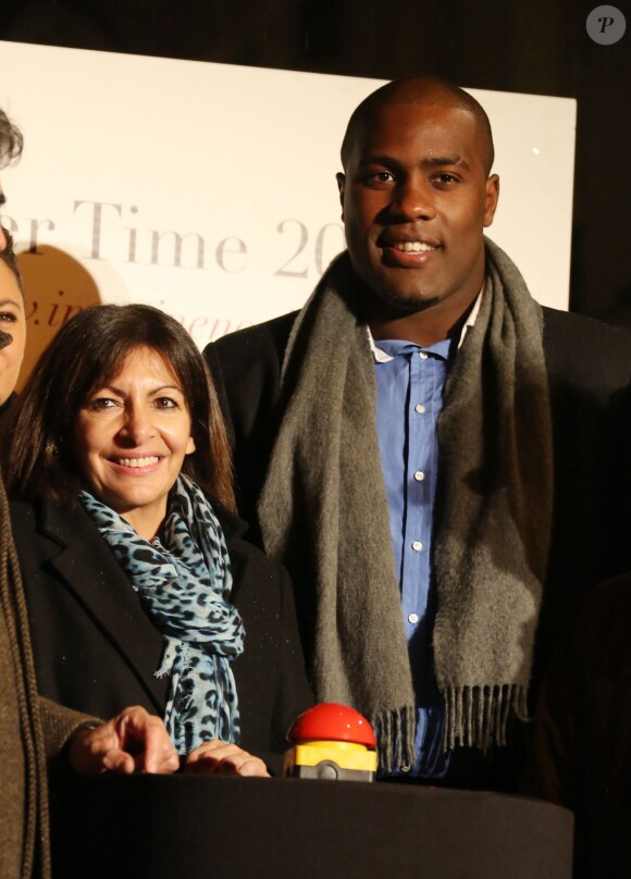 Anne Hidalgo et Teddy Riner lors du lancement des illuminations du Faubourg Saint-Honoré à Paris, le 14 novembre 2013
