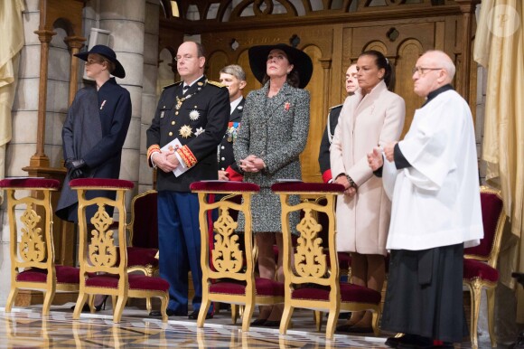 La princesse Charlene, le prince Albert II, la princesse Caroline de Hanovre et la princesse Stéphanie de Monaco lors de la célébration de la Messe d'action de grâce et du Te Deum à la Cathédrale de Monaco à l'occasion de la fête nationale, le 19 novembre 2013