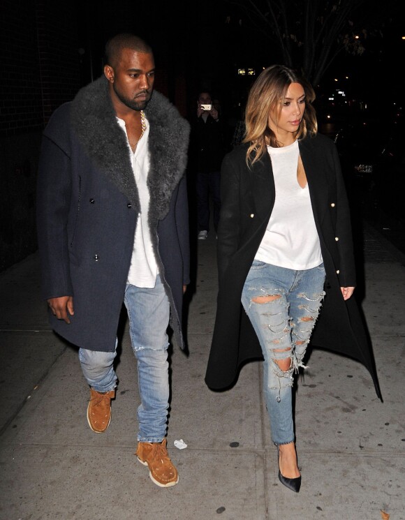 Kanye West et Kim Kardashian, parfaitement assortis, se rendent au Barclays Center à Brooklyn, où Kanye West livre son second concert. New York, le 20 novembre 2013.