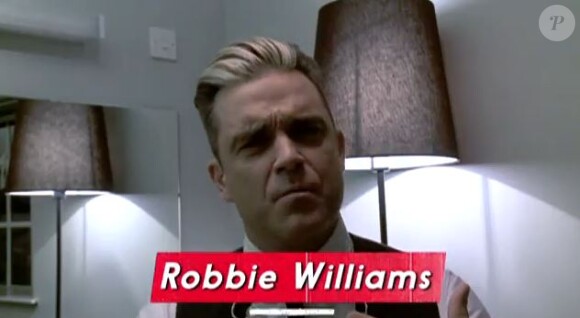Robbie Williams participe au projet 1D Day le 23 novembre 2013.
