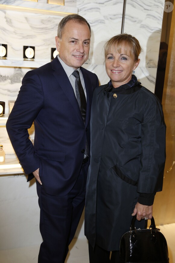 Michael Burke et sa femme Bridget à la réouverture de la boutique Guerlain et du restaurant Le 68 sur les Champs-Elysées à Paris. Le 21 novembre 2013