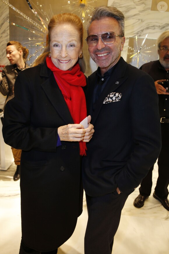 Doris Brynner et Olivier Echaudemaison à la réouverture de la boutique Guerlain et du restaurant Le 68 sur les Champs-Elysées à Paris. Le 21 novembre 2013