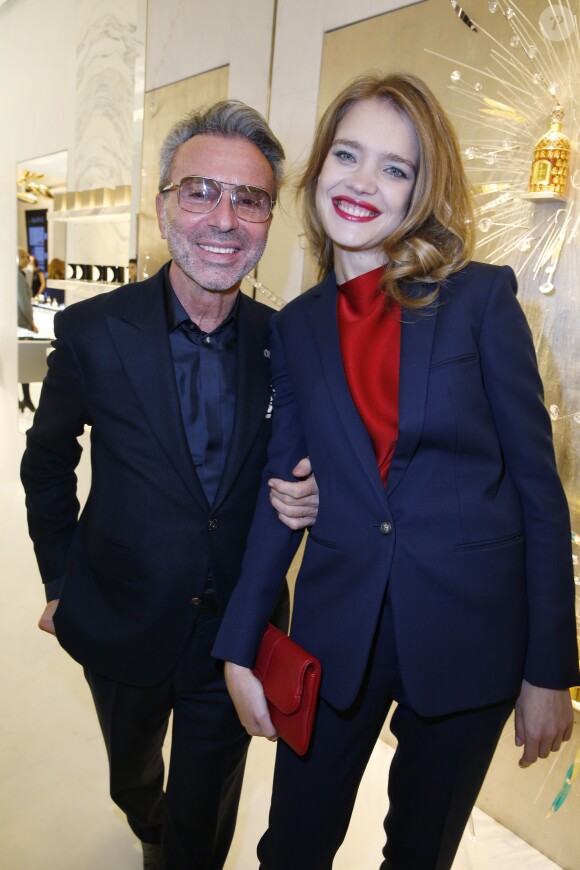 Olivier Echaudemaison et Natalia Vodianova, enceinte à la réouverture de la boutique Guerlain et du restaurant Le 68 sur les Champs-Elysées à Paris. Le 21 novembre 2013
