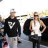 Paris Hilton, accompagnée de son petit-ami River Viiperi, arrive à l'aéroport de Los Angeles, le 14 Novembre 2013, pour prendre l'avion direction l'Asie.